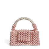 Sac à main en perles de cire rose texturé de niche avancée fait à la main